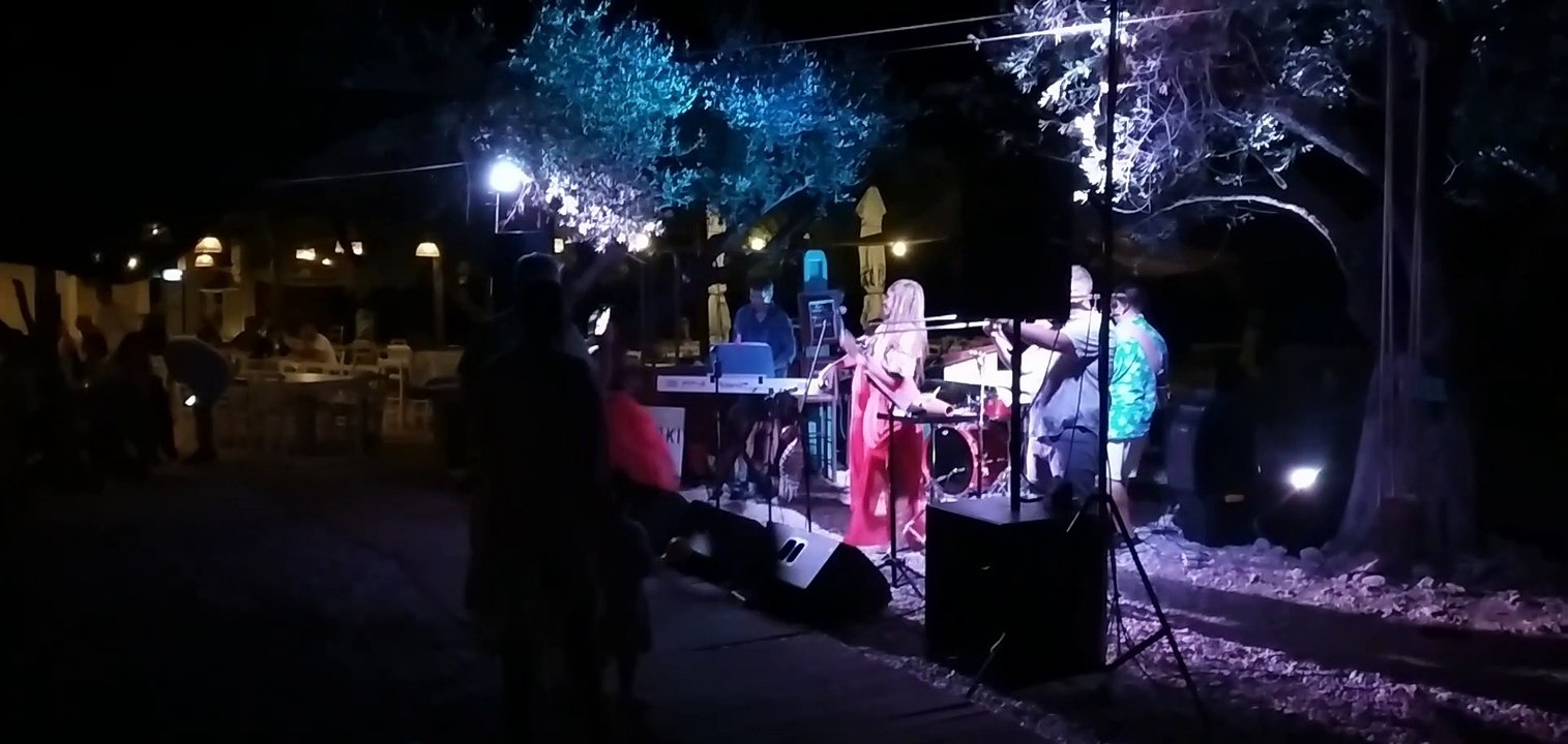 summer 2022, ithaca , beach filiatro , listening to cubaneros and admiring the power of nature