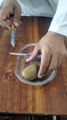 how to cut kiwi fruit.kiwi fruit cutting skill.