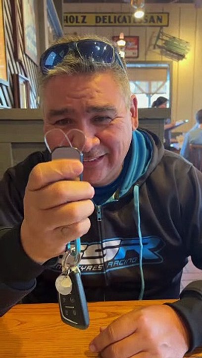 Guy Loves His Keychain Glasses