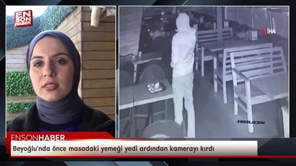 Beyoğlu'nda önce masadaki yemeği yedi ardından kamerayı kırdı