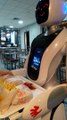 A Robot Waitress Delivers The Food