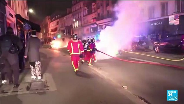 Hundreds protest pension reforms in Paris ahead of Macron interview