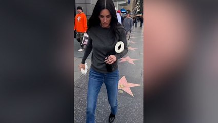 Courtney Cox channels inner Monica by cleaning Hollywood Walk of Fame star