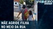 Flagra mãe puxa filha pelos cabelos no meio da rua