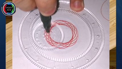 DIBUJANDO un anillo rojo utilizando un ESPIROGRAFO. DRAWING a red ring using a SPIROGRAPH.