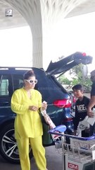 Kajol in bright yellow outfit