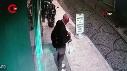 Şişli’de ilginç hırsızlık kamerada: Yaşlı hırsız mali defteri çalıp çikolata yedi