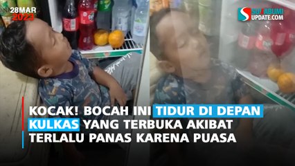 Kocak! Tidak Kuat Puasa Akibat Cuaca Panas Bocah ini Tidur di Depan Kulkas yang Terbuka