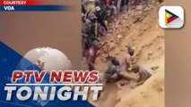 Miners seen getting out of collapsed gold mine in Congo