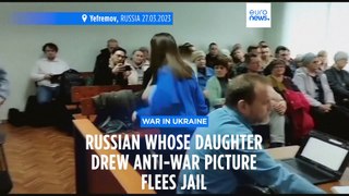 Russian court convicts father of teen daughter who drew anti-war pictures at school