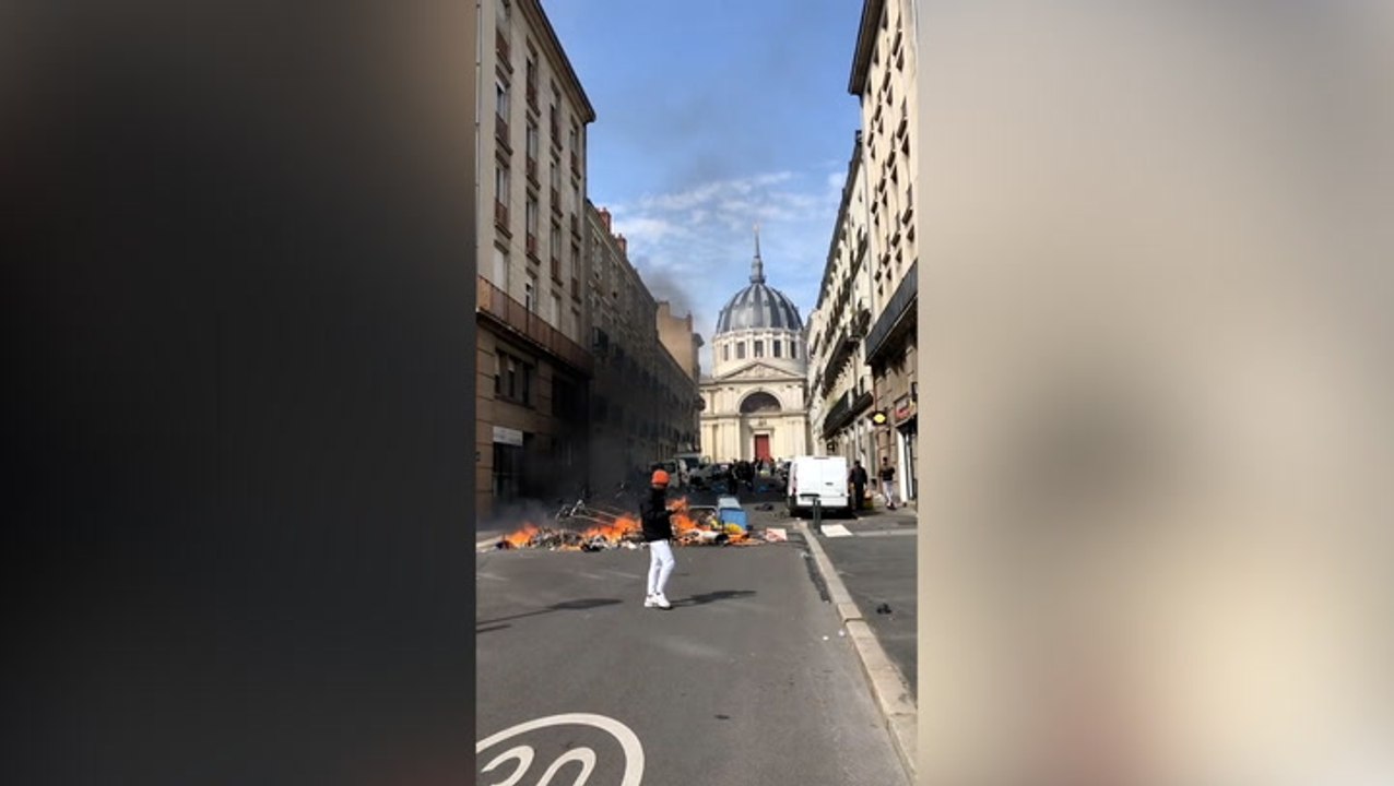 French pension reform: Passerby casually stroll...
