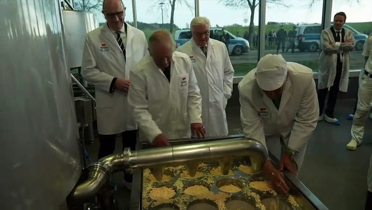 King of cheeses: Charles takes part in dairy production at farm