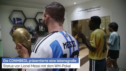 CONMEBOL enthüllt Messi-Statue mit WM-Pokal