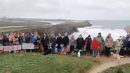 campaigners line the stretch of coastline to show their love for the area