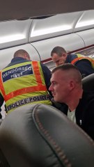 Airplane Passengers Cheer For Police During Arrest