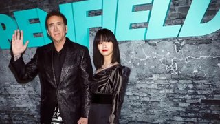 Nicolas Cage and wife coordinate in tiger stripes at ‘Renfield’ premiere