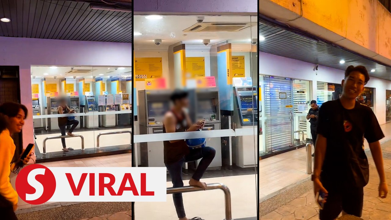 VIRAL: Anxious moments for duo trapped in bank'...