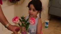 Grateful kid blooms with happiness after dad gets her her favorite flowers