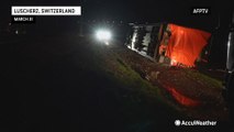 Fifteen people hurt as two Swiss trains derail in storm