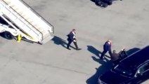 Moment Donald Trump exits plane upon arrival in New York ahead of arraignment