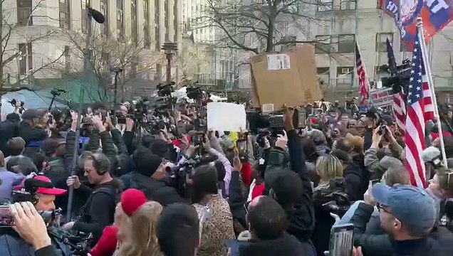 Donald Trump supporter Marjorie Taylor Greene jeered as she addresses crowds outside New York court