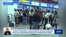 Ilang pasahero, sinalubong ng mahabang pila sa ticketing booth sa Batangas Port | Saksi