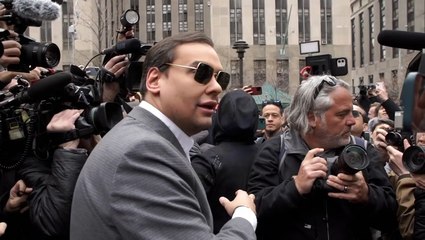 Embattled congressman George Santos surrounded by crowds at Trump arraignment scene