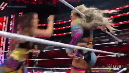 Raquel Rodriguez launches Liv Morgan over the top rope to take out IYO SKY & Dakota Kai