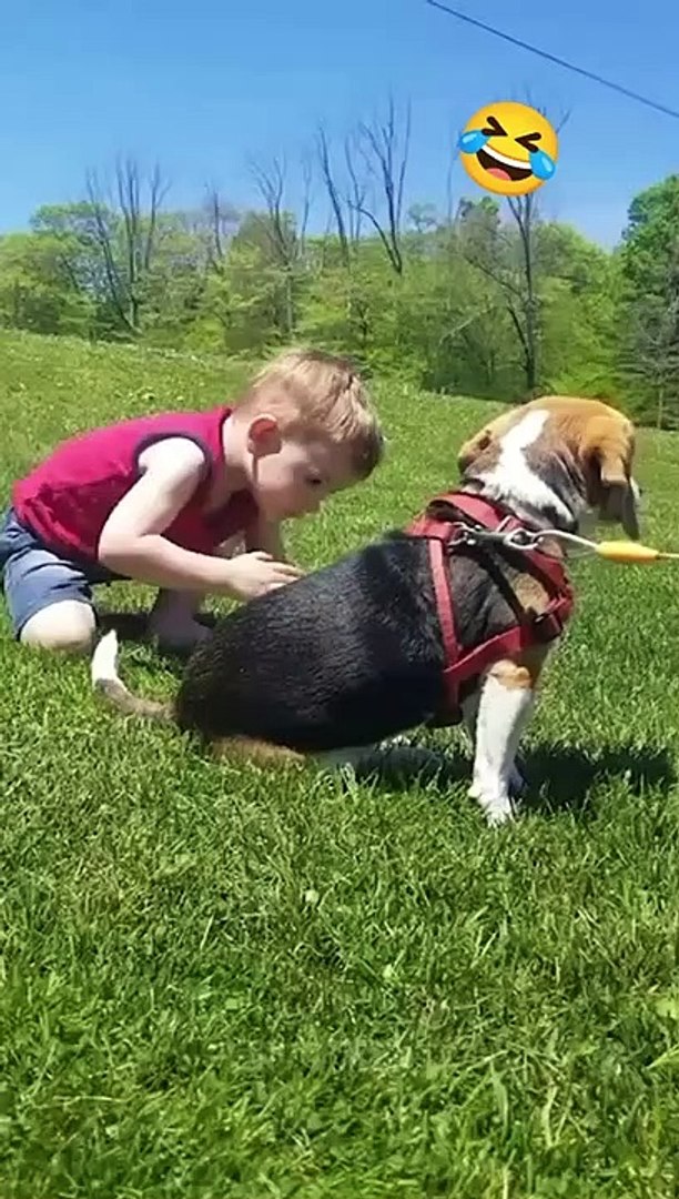 ⁣Boy making fun with his pet