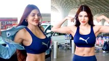 Sherlyn Chopra Removes Jacket At Airport, Flaunts Toned Body
