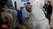 Pope Francis washes and kisses feet of prisoners in traditional Holy ritual