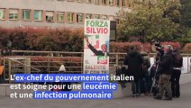 Italie: des partisans de Silvio Berlusconi devant l'hôpital où il est soigné