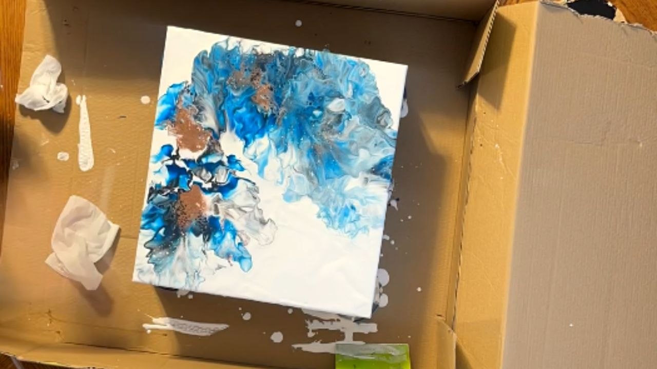 Creative artist uses acrylic pour to create a stunning art piece *fluid art*