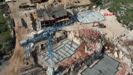 ALTINÖZÜ'NDE DEPREM KONUTLARI İNŞAATI İKİNCİ KATA YÜKSELDİ