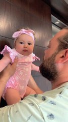 daddy kissing baby