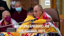 Dalai Lama apologises after video shows him kissing a young boy and asking him t