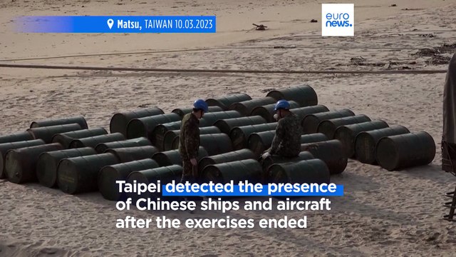 Taiwan says Chinese navy ships are still in nearby waters despite Beijing saying drills have stopped