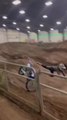 Biker Gets Thrown Off His Dirt Bike While Performing Stunt in Pit of Uneven Mud