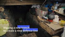 Ukrainian soldiers dig new trenches in case of heavy Russian assault
