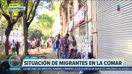 Migrantes esperan ser atendidos en la Comar