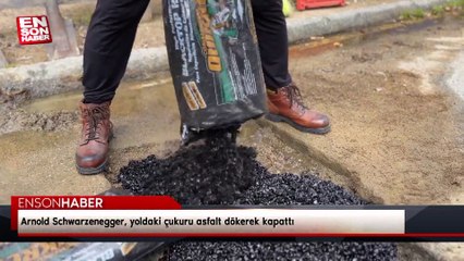 Arnold Schwarzenegger, yoldaki çukuru asfalt dökerek kapattı
