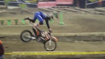 Biker Falls Down While Attempting Trick on Obstacle Race Track