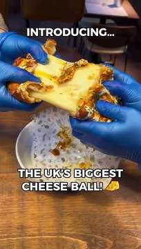 Foodies hail UK's biggest cheese ball - weighing 2kg with 5,000 calories