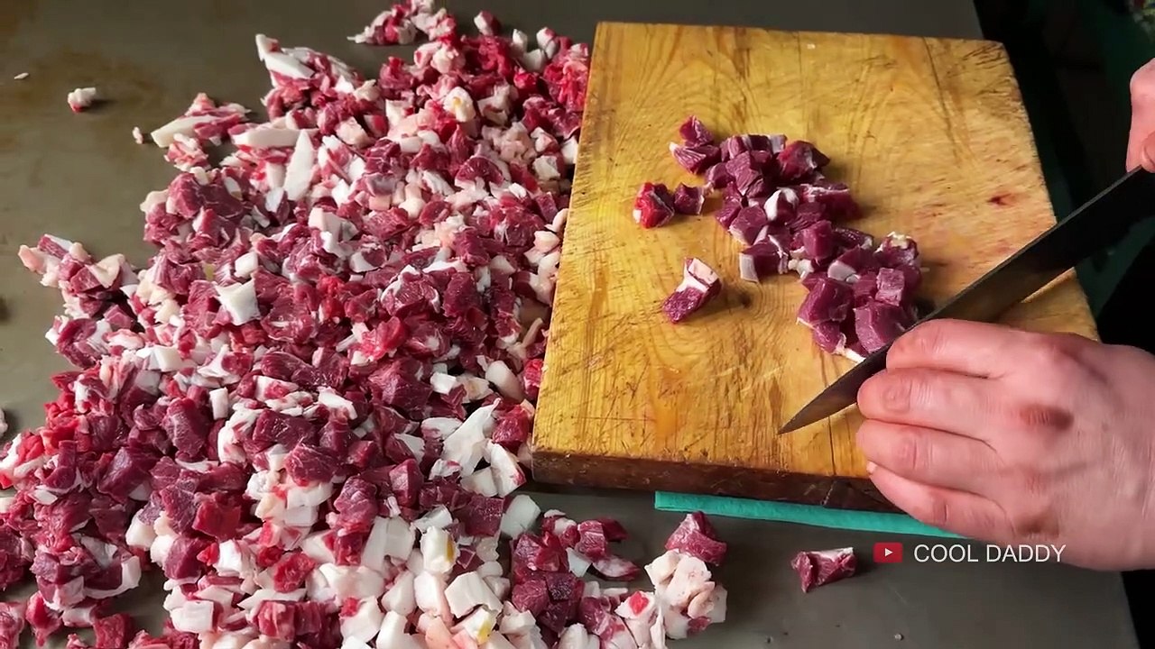 Uzbek  SNAKE_ Shaped MEAT in Tandoor. TRADITIONAL Street Food. Uzbek Cuisine