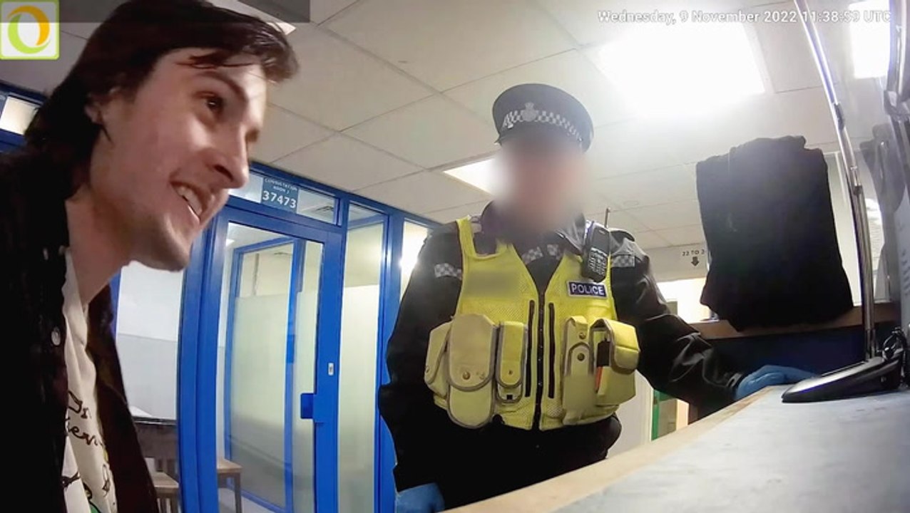 Police footage shows moments after protester arrested for throwing eggs at King