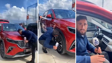 Muhabir Togg'un kaputunu ve tekerliğini öptü