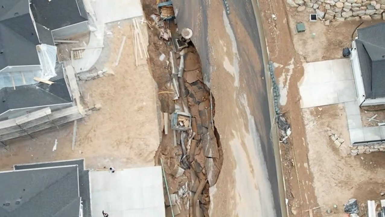 Large sinkholes open in Utah city after heavy flooding, prompting evacuations