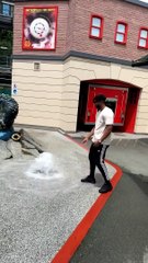 Guy Running Through Fountain Runs into Statue