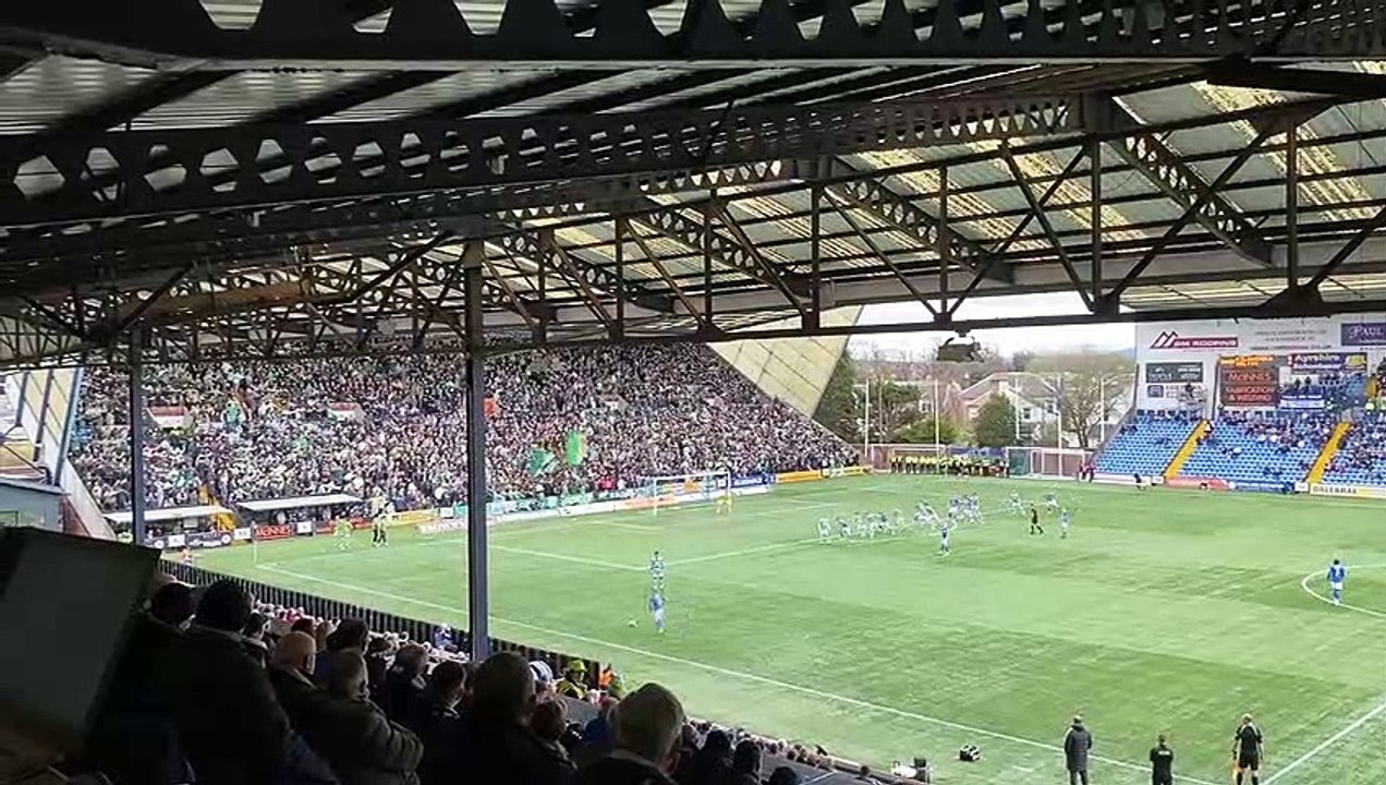 Celtic fans celebrate their team's fourth goal against Kilmarnock