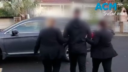 NSW man charged with selling Australian defence secrets to two Chinese spies